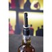 Capuchón para dosificadores de licor